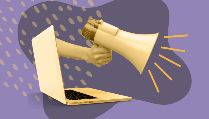 Montagem abstrata: uma mão saindo de um notebook segura um megafone.