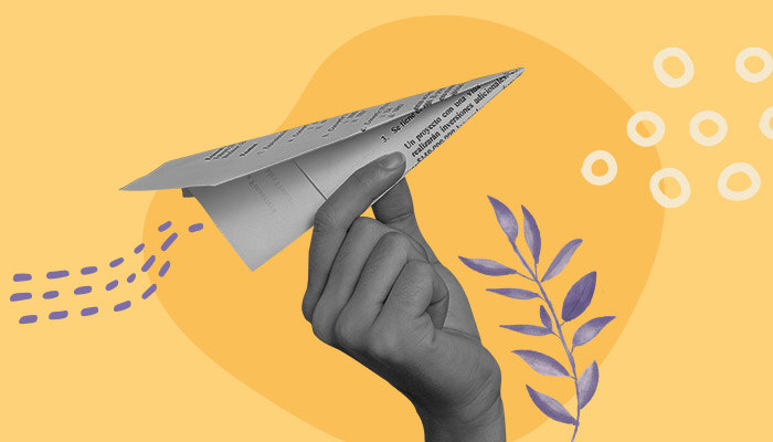 Ilustração: uma mão segurando um aviãozinho de papel.