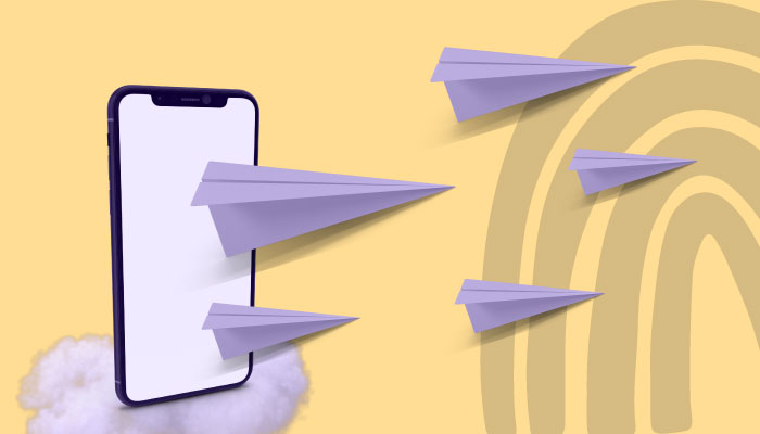 Vários aviãozinhos de papel saindo da tela de um smartphone.
