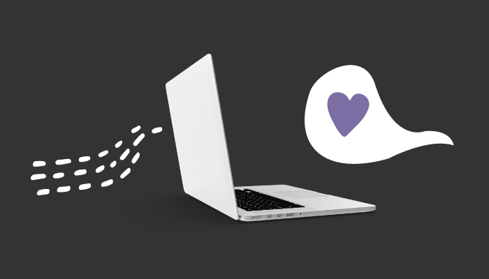 Imagem mostra laptop e balão de conversa com um coração dentro