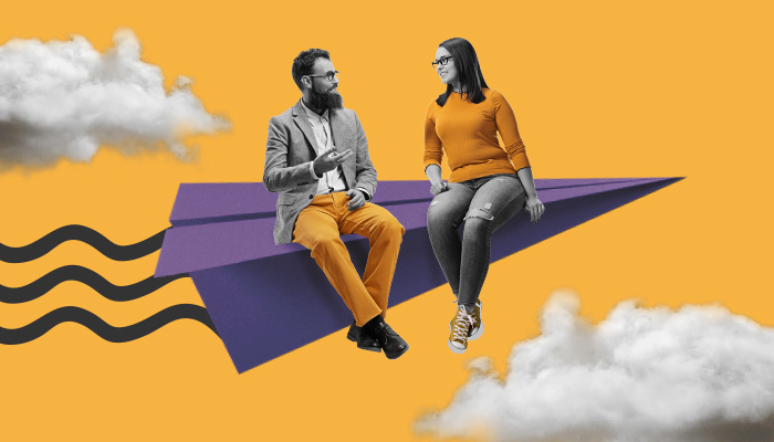 Um homem e uma mulher conversando em um avião de papel