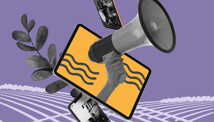 Ilustração: uma mão segurando um megafone saindo da tela de um dispositivo móvel.